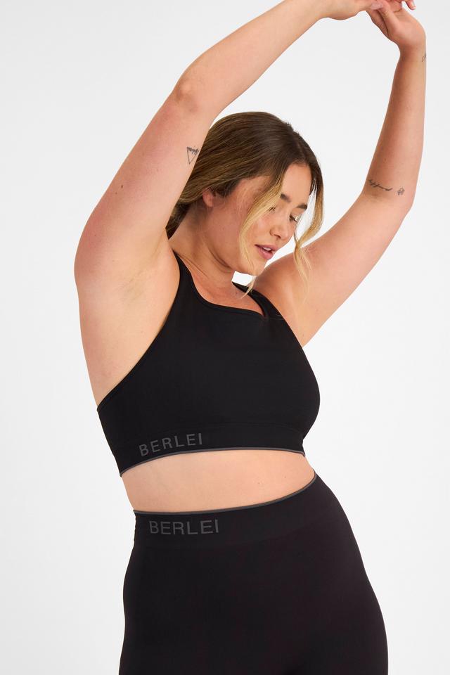 Chanel (She/Her) wears size 14D and is 176cm tall with 104cm chest and 89cm waist