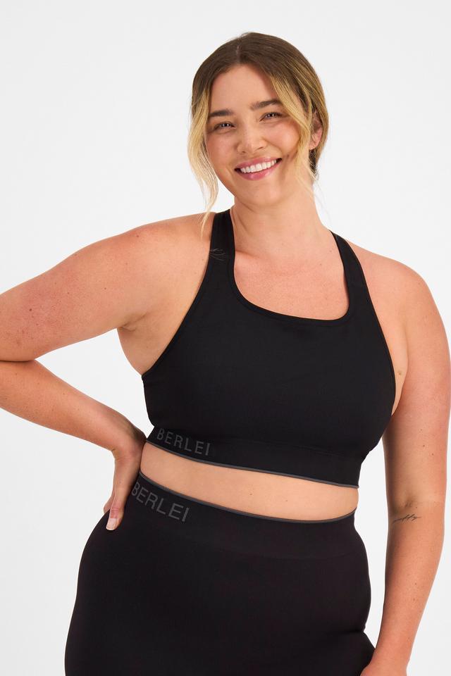 Chanel (She/Her) wears size 14D and is 176cm tall with 104cm chest and 89cm waist