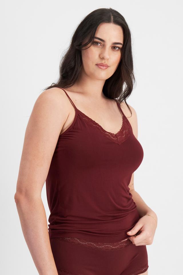 Jacqleen (She/Her) wears size 14DD and is 183cm tall with 93cm chest and 73cm waist