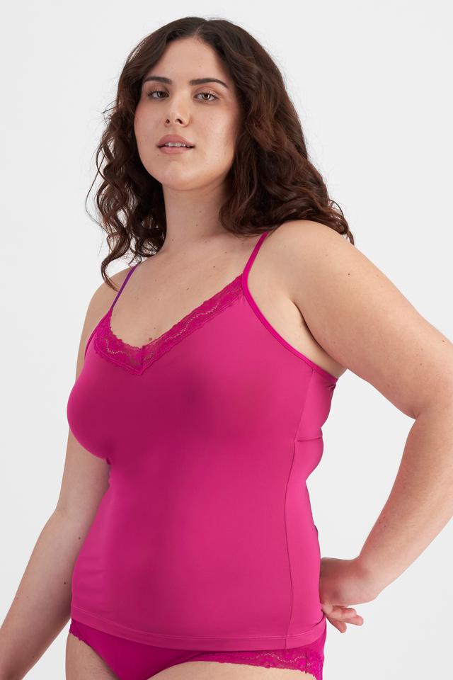 Bella (She/Her) wears size 14D and is 173cm tall with 95cm chest and 77cm waist