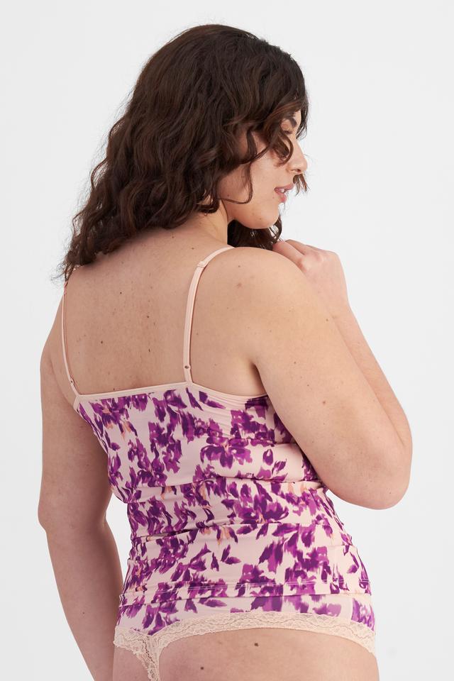 Bella (She/Her) wears size 14D and is 173cm tall with 95cm chest and 77cm waist
