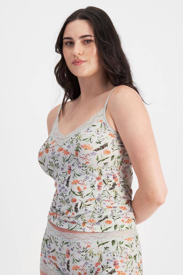 Jacqleen (She/Her) wears size 14DD and is 183cm tall with 93cm chest and 73cm waist