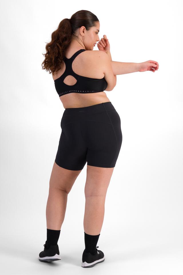 Brittany (She/Her) wears size 12 and is 173cm tall with 93cm chest and 78cm waist