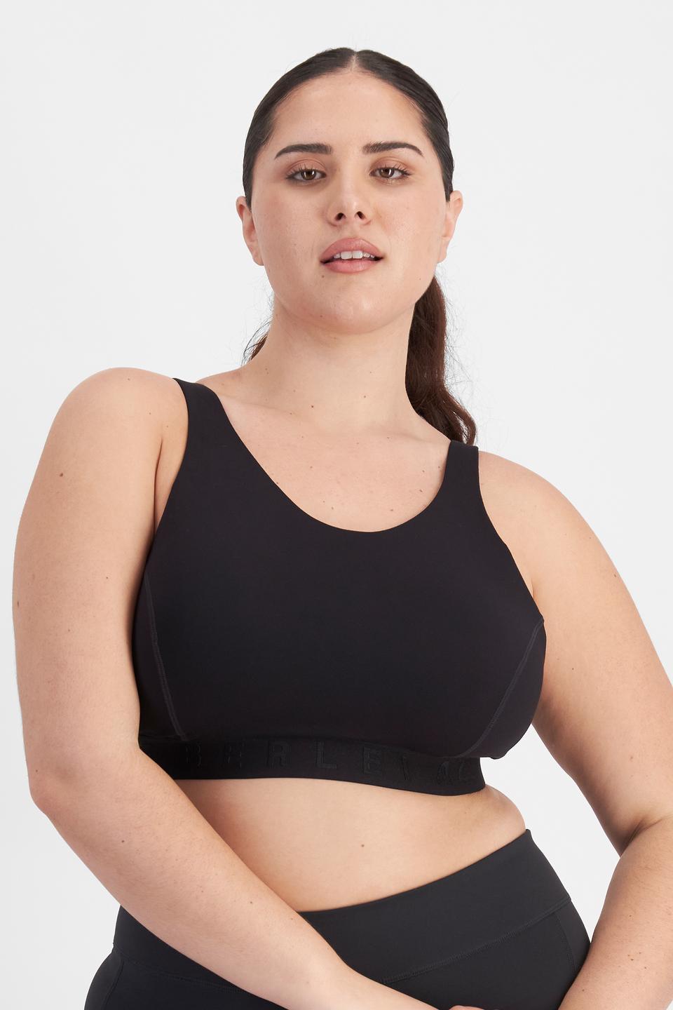 Bella (She/Her) wears size 14D and is 173cm tall with 95cm chest and 77cm waist
