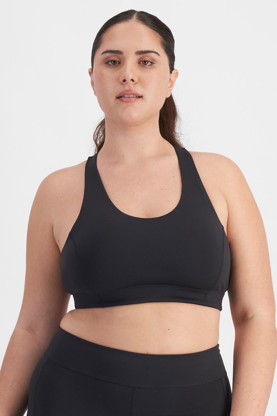 Bella (She/Her) wears size 14D and is 173cm tall with 95cm chest and 77cm waist
