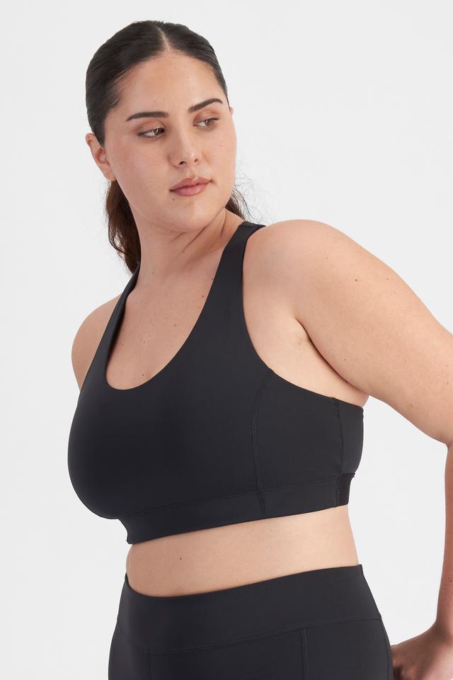 Bella (She/Her) wears size 14D and is 173cm tall with 95cm chest and 77cm waist