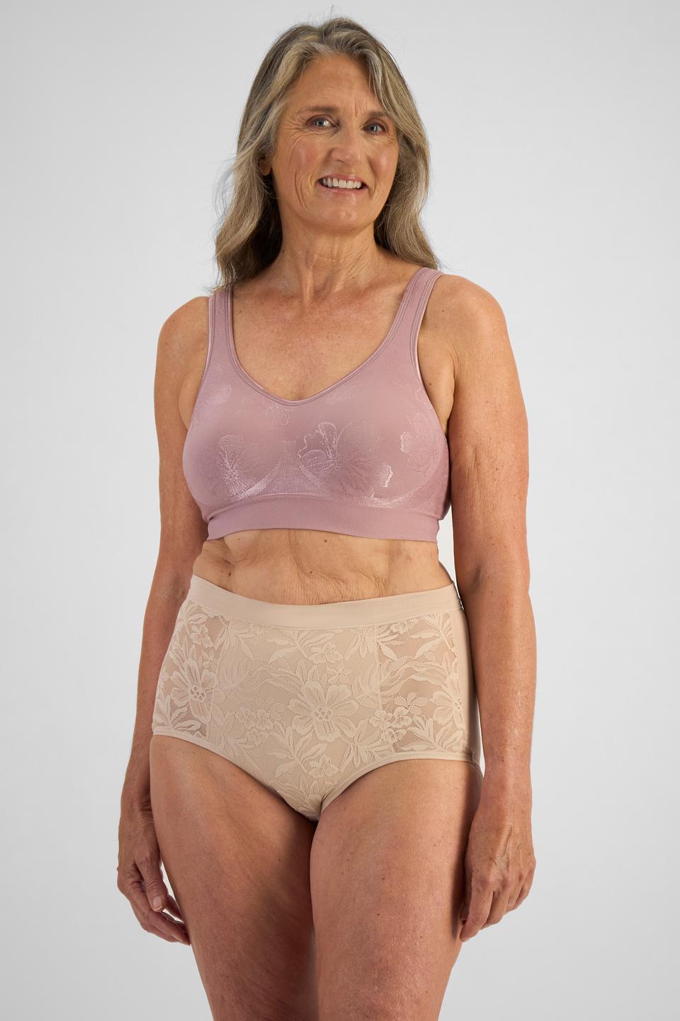 Kerry (She/Her) wears size 14D and is 170cm tall with 97cm chest and 74cm waist
