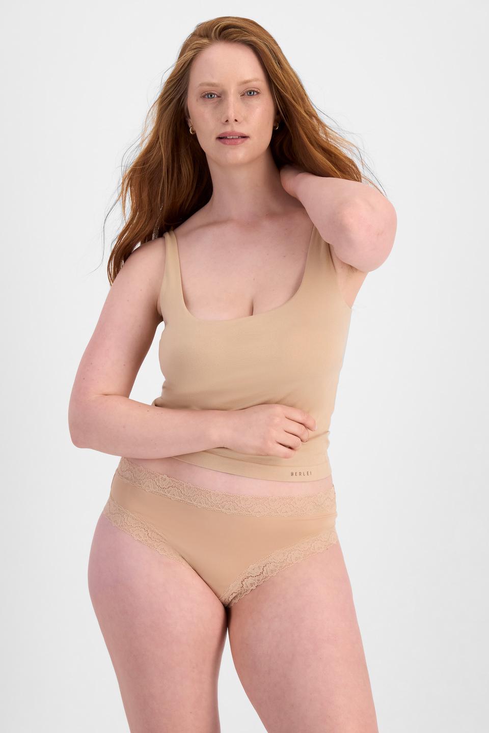Martine (She/Her) wears size 14 and is 175cm tall with 82cm chest and 76cm waist