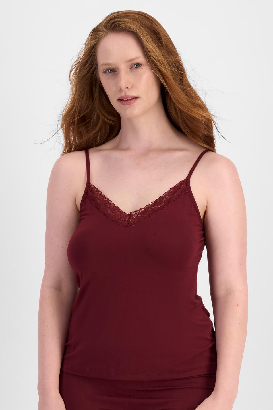 Martine (She/Her) wears size 14DD and is 175cm tall with 82cm chest and 76cm waist